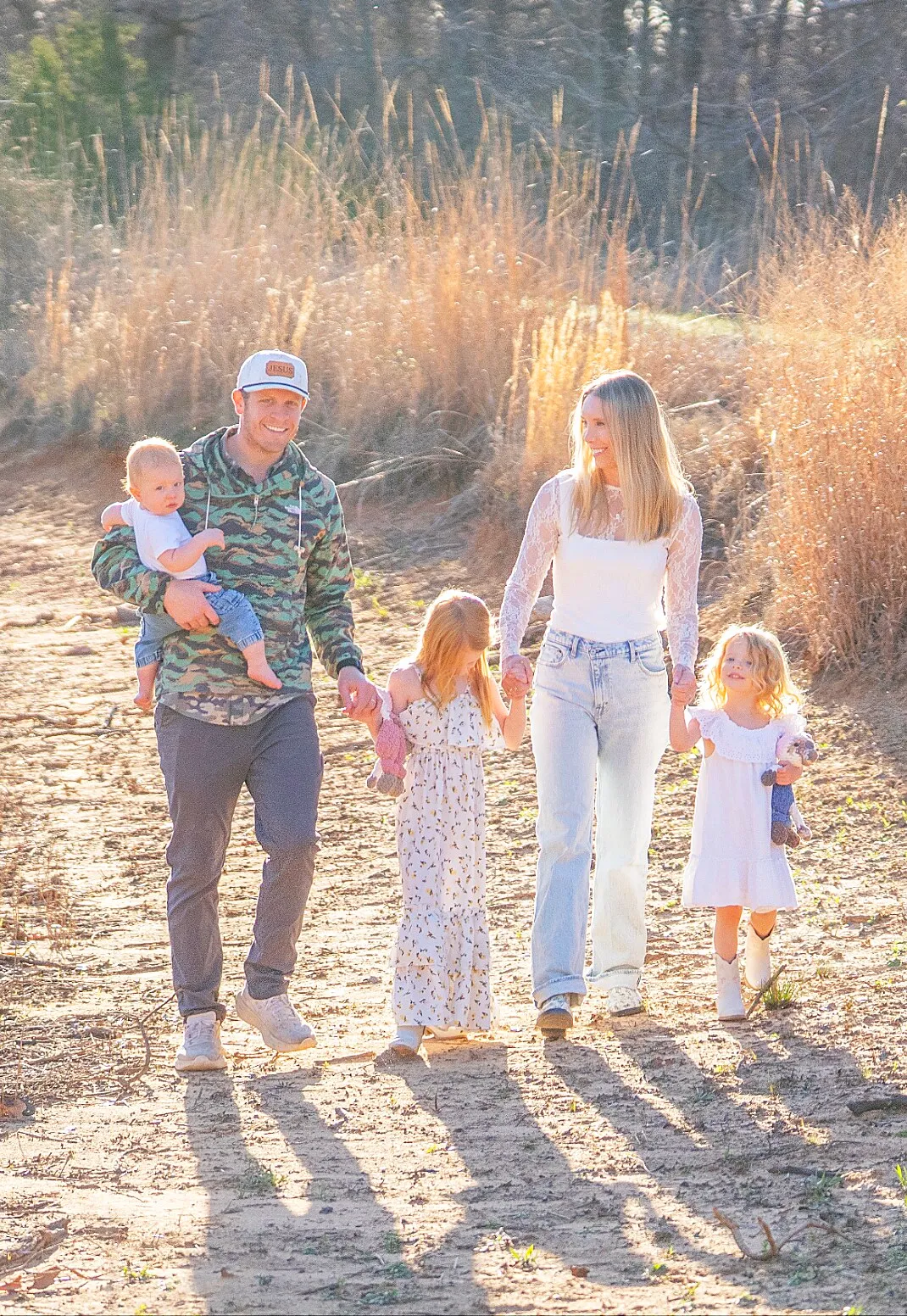 Conner Nielsen walking with his family on a golden Fort Worth evening